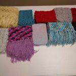photo of 10 crocheted scarves