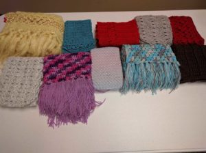 photo of 10 crocheted scarves